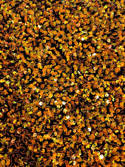 Stephanie IRIDESCENT ORANGE Overlap Sequins on BLACK Stretch Velvet Fabric by the Yard for Gowns, Apparel, Costumes, Crafts - 10185