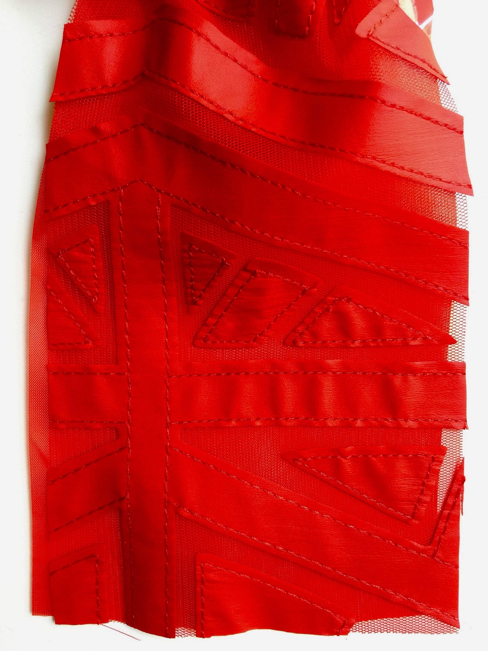 McKinley RED Geometric Cutout Vinyl on Mesh Fabric by the Yard - 10105